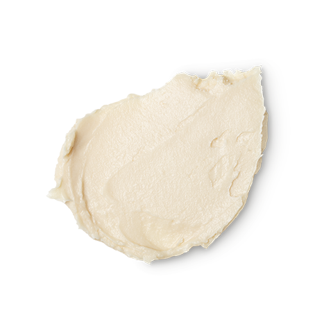 A swatch of Happy Skin, a smoothly textured white facial scrub.